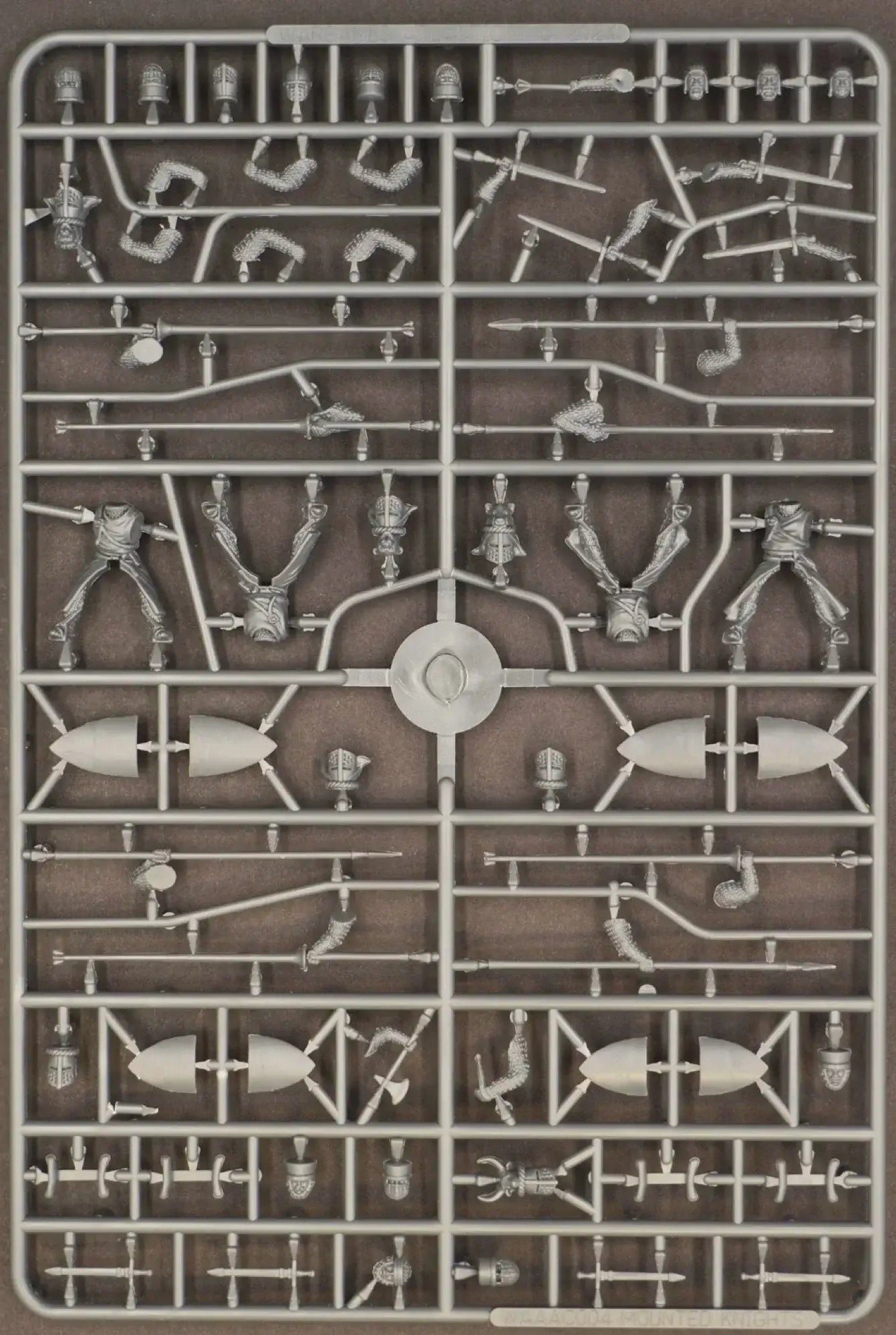 Mounted knights model kit sprue featuring detailed metal components for 12th and 13th century cavalry figures.