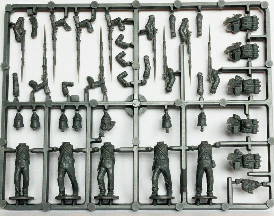 French Napoleonic Infantry Battalion unassembled plastic figures on a frame, including rifles and equipment.